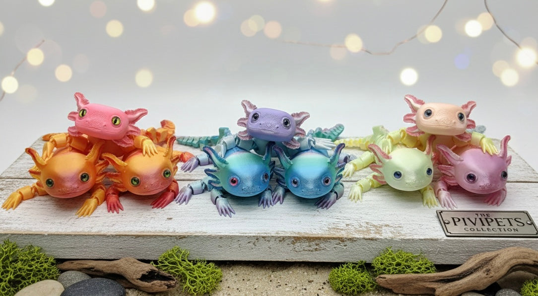 Colorful axolotl figurines on a wooden surface with a blurred light background